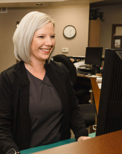 Woman behind a computer